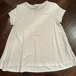 Eileen Fisher pale blush pink T.  Has a wide swingy bottom.  Easy wearing.